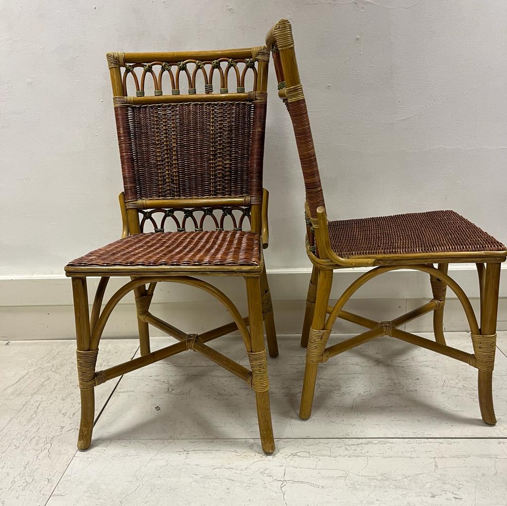 A pair of French Vintage Grange Wicker and bamboo chairs / dining